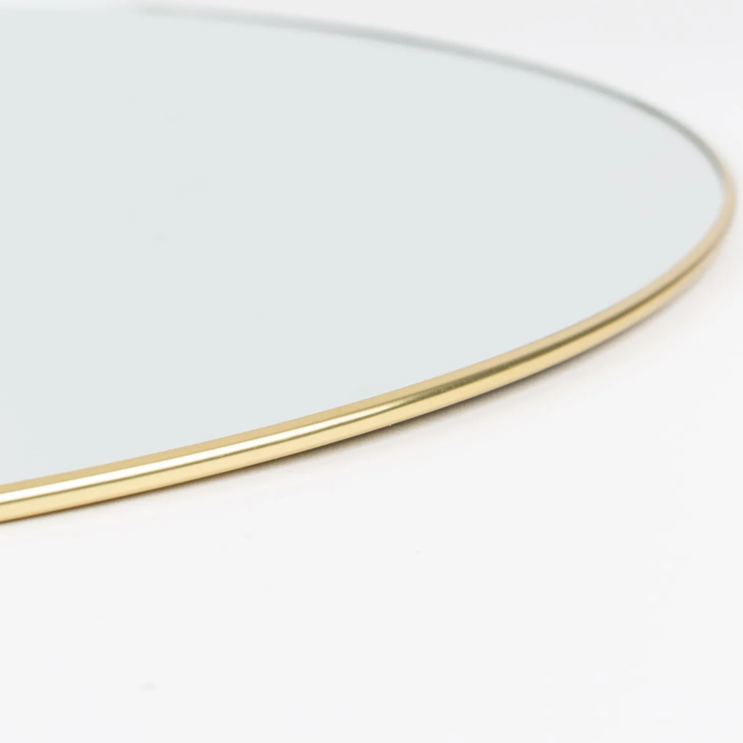 Espejo de pared redondo de metal dorado Orión Ø55cm