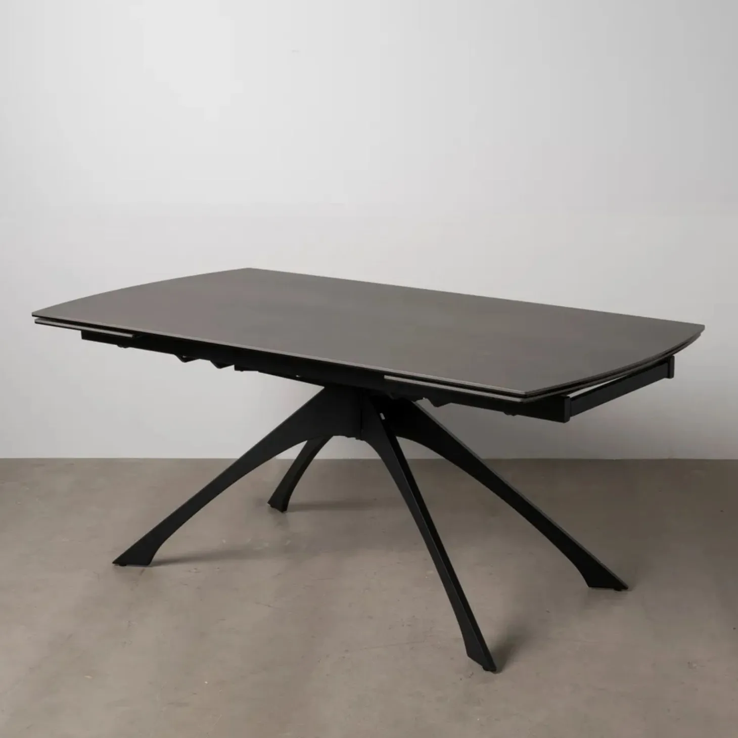 Mesa de comedor extensible de cerámica y cristal gris oscuro 180/260x90x76cm